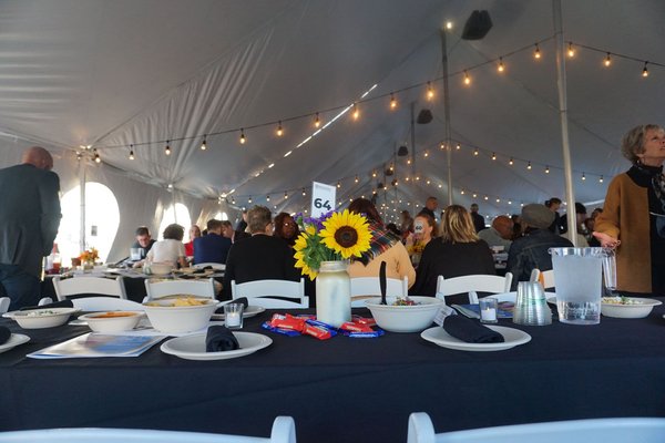 Table with Crowd in Background